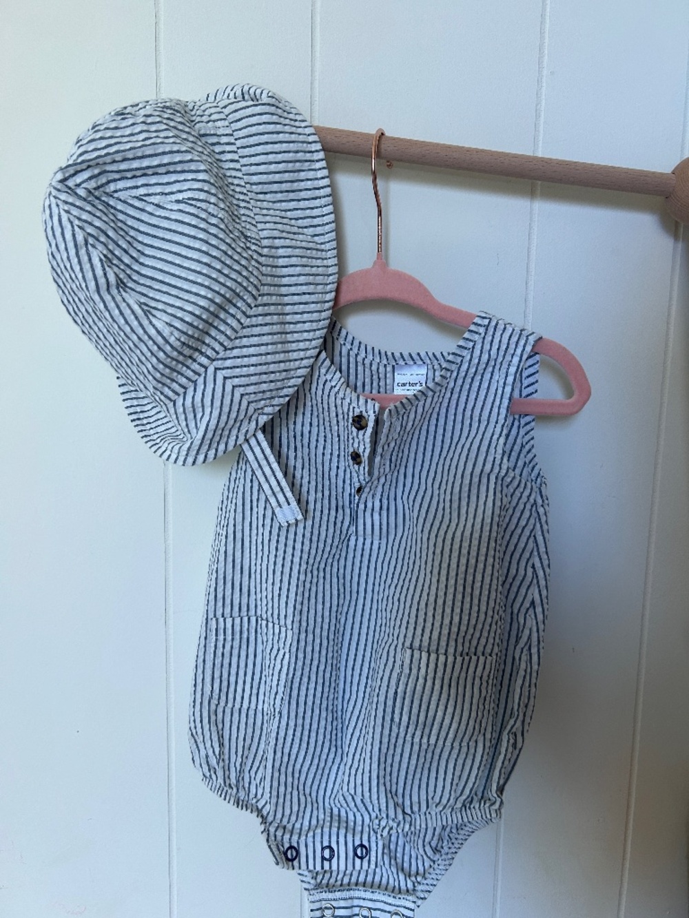 Blue and white striped onesie with matching hat